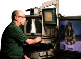 Ontario Telemedicine Network technician videoconferencing