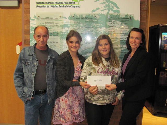 Turcotte Family making donation