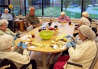 Respite care patients at a table